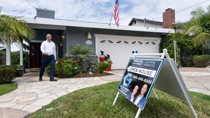 home-for-sale-person-walking-getty.jpg
