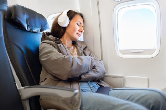 caucasian-woman-sleeping-peacefully-headphones-133495665.jpg